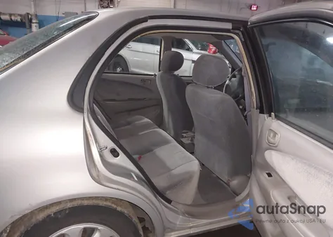 2002 Toyota Corolla Le z USA, uszkodzony, nr VIN 1NXBR12E12Z574448